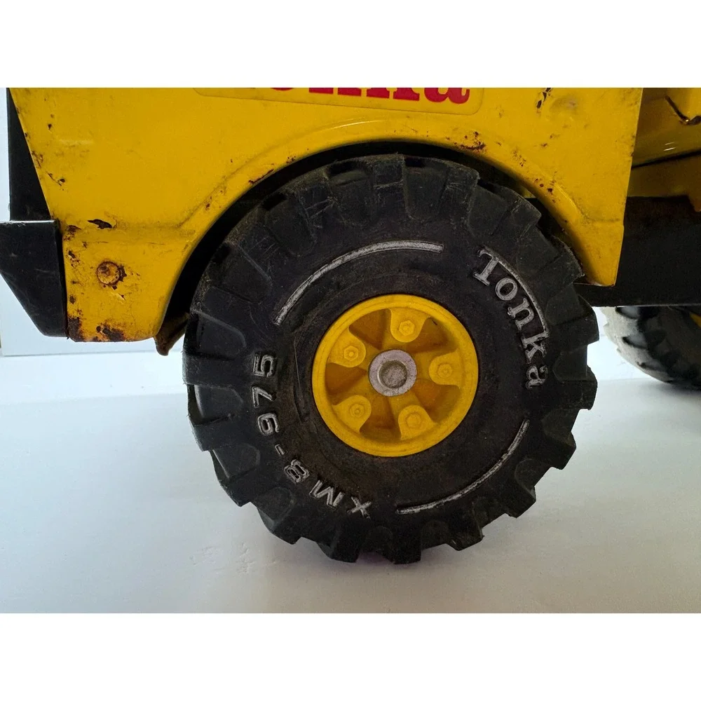 Vintage 1970s Mighty Tonka Dump Truck XMB-975 Pressed Steel Yellow Heavy Duty